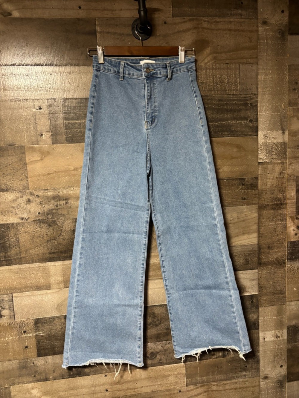 Annie wear High-Rise Light Blue Wide-Leg Jeans with Raw Hem Small